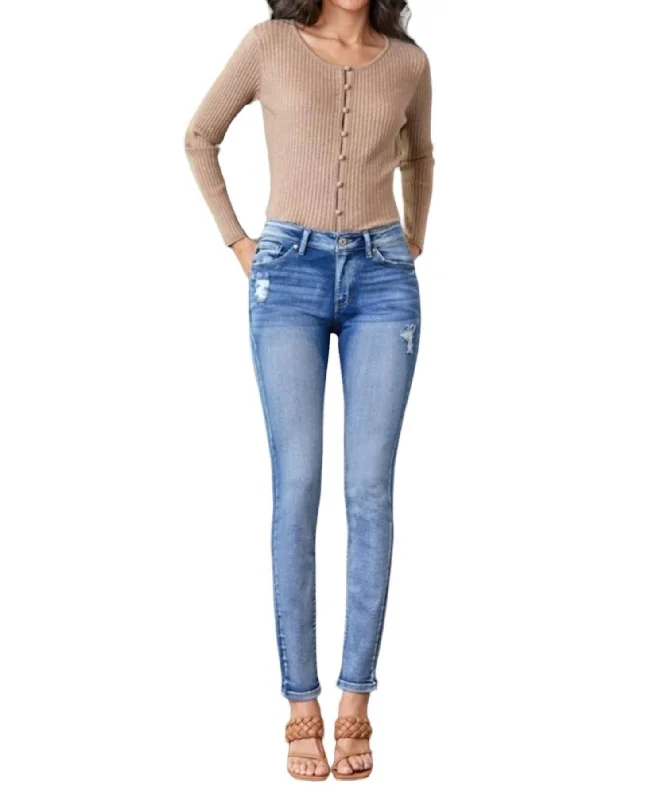 Mid Rise Slightly Distressed Skinny Jean Medium In Denim